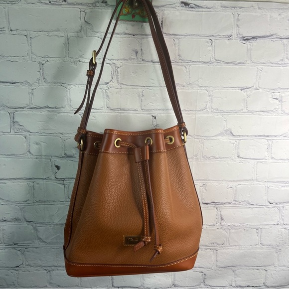 Dooney & Bourke Handbags - Dooney & Bourke Pebbled Leather Tan Bucket Bag Purse